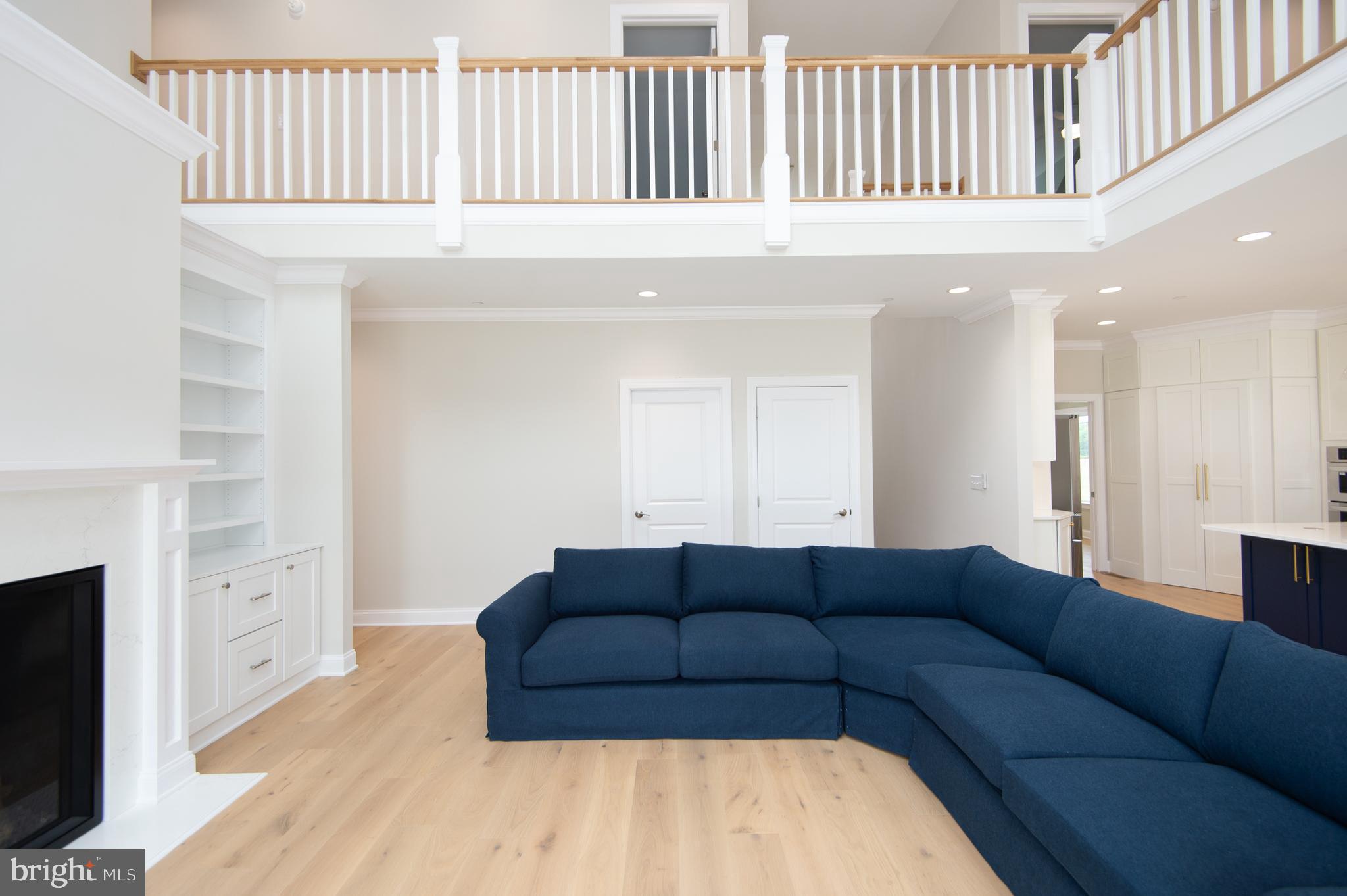 2202 Horns Point Road Cambridge, MD 21613 - Photo 37 of 74 Living room w/view of second floor balcony