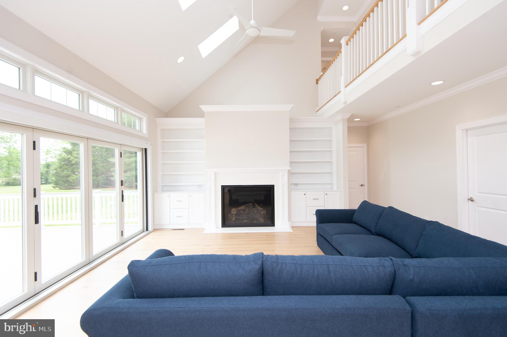2202 Horns Point Road Cambridge, MD 21613 - Photo 38 of 74 Living room w/ gas fireplace