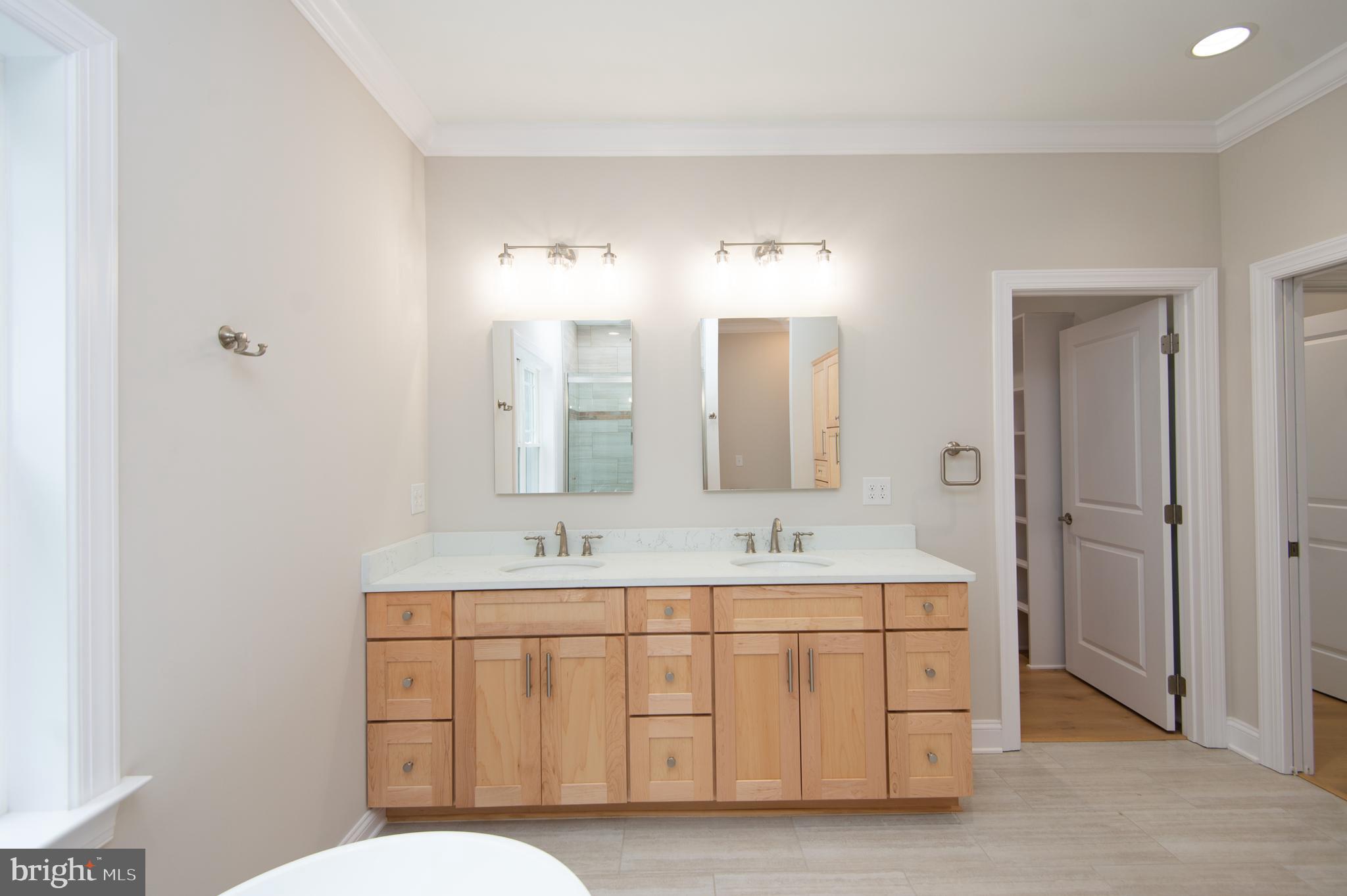 2202 Horns Point Road Cambridge, MD 21613 - Photo 44 of 74 Primary bath double sinks