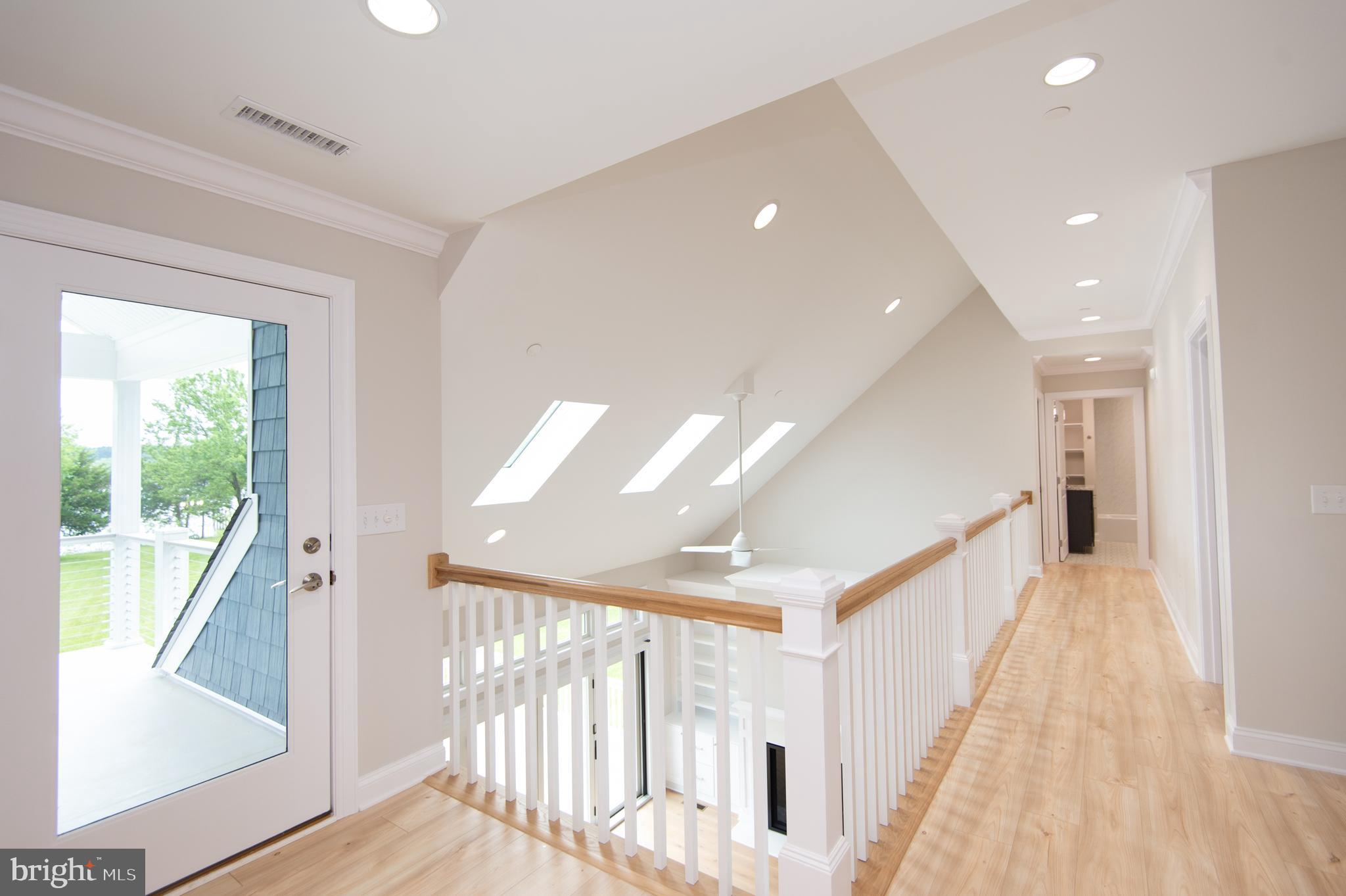 2202 Horns Point Road Cambridge, MD 21613 - Photo 64 of 74 Second floor foyer to balcony