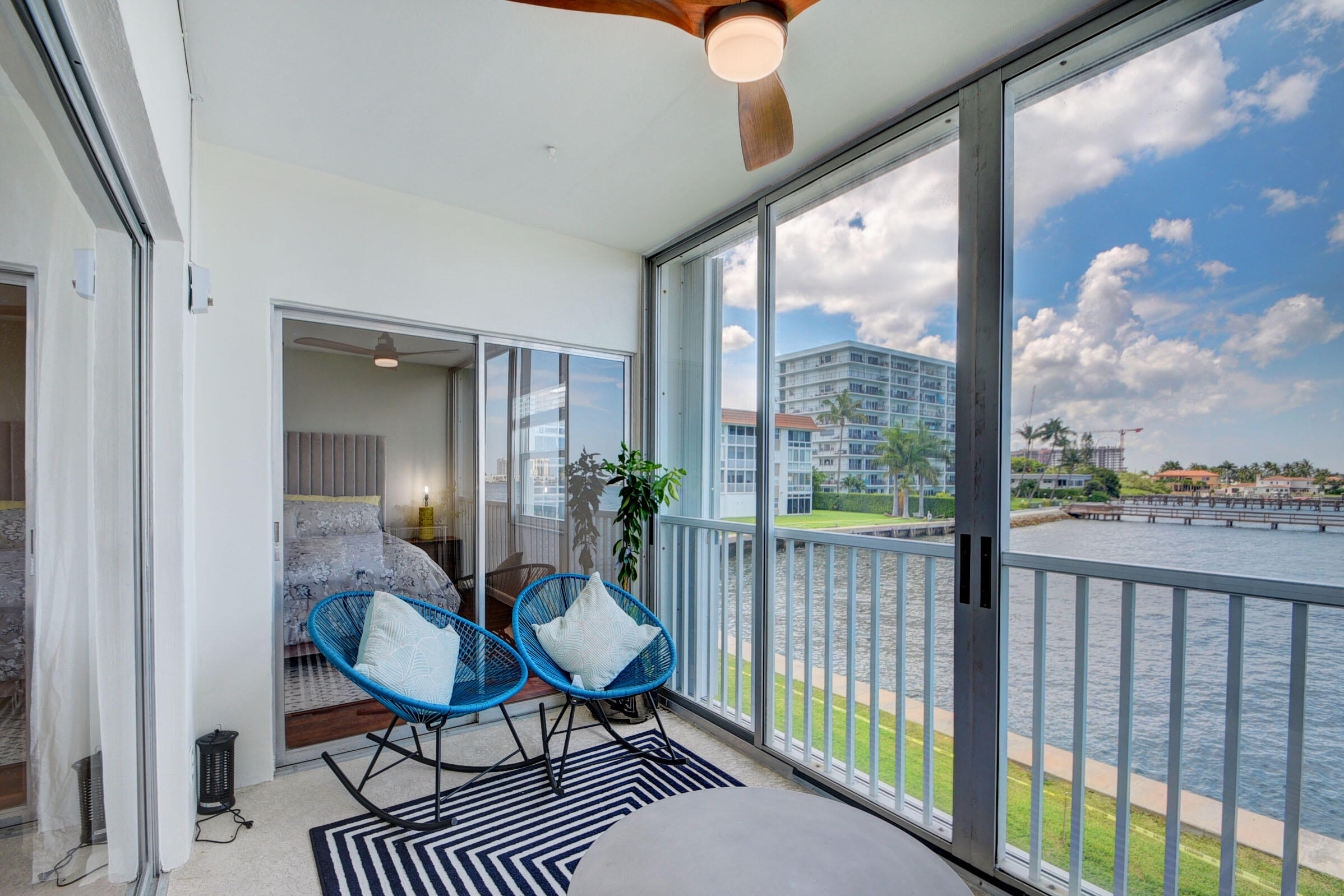 410 Wilma Circle, Unit 204 Riviera Beach, FL 33404 - Photo 1 of 25 a view of a balcony with chairs