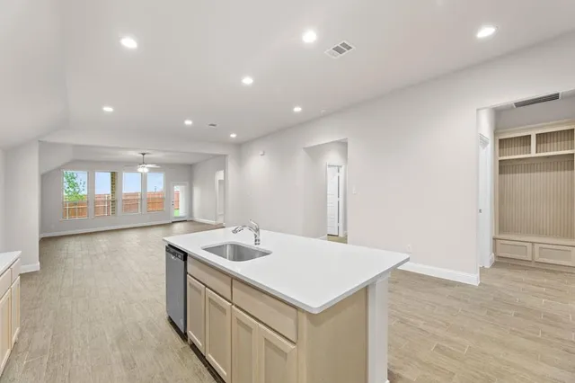 a view of living room with granite countertop furniture and fireplace