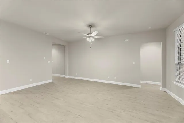 a kitchen with stainless steel appliances granite countertop a sink and a stove