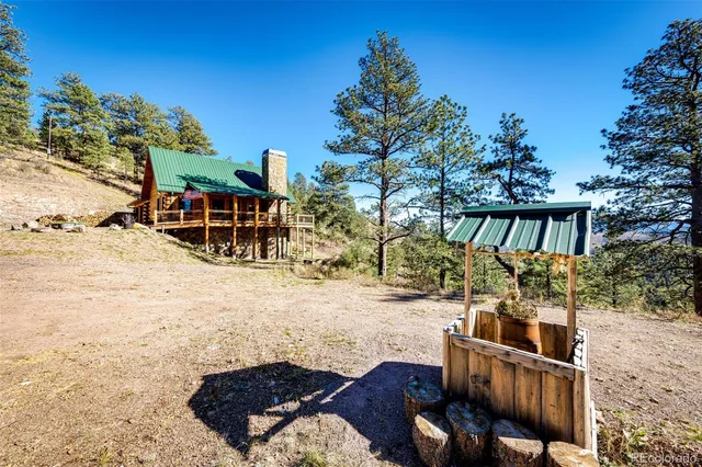 a view of roof deck with a patio