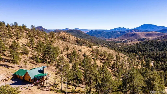 a view of a house with a mountain
