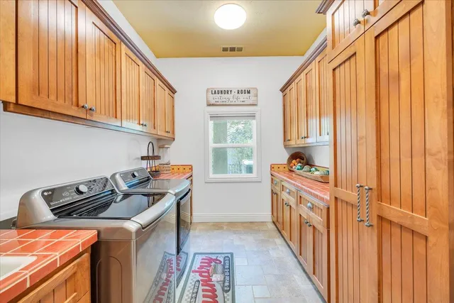 an aerial view of a house with outdoor space
