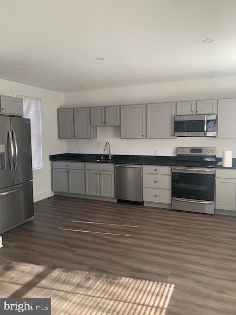 1305 Front Street Lititz, PA 17543 - Photo 4 of 9 a kitchen with stainless steel appliances granite countertop a stove and a refrigerator