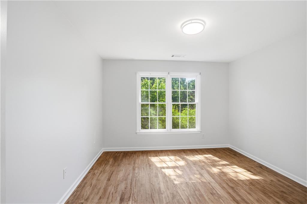 110 Mayes Farm Road Northwest Marietta, GA 30064 - Photo 32 of 49 an empty room with a window