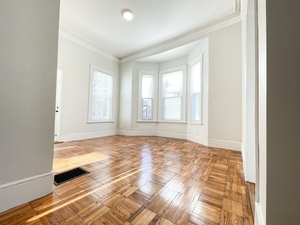 30 Woodbine Street Boston, MA 02119 - Photo 12 of 41 a view of an empty room and window