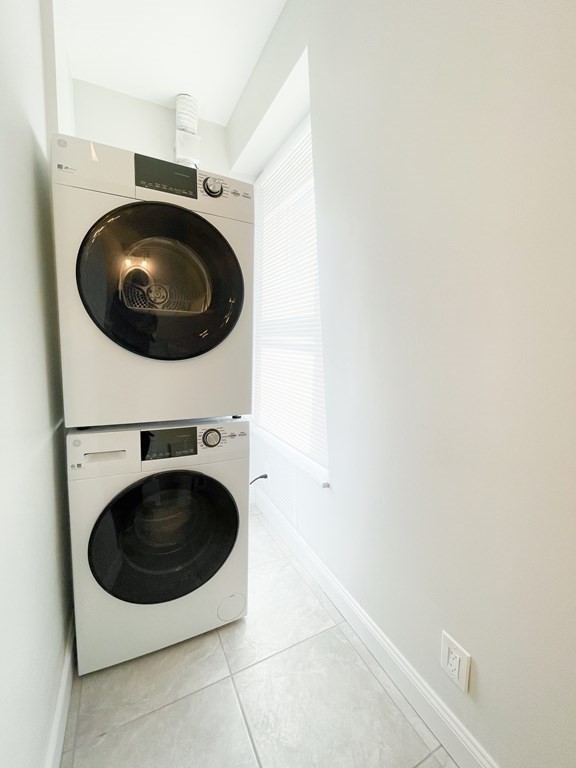 30 Woodbine Street Boston, MA 02119 - Photo 29 of 41 a utility room with dryer and washer