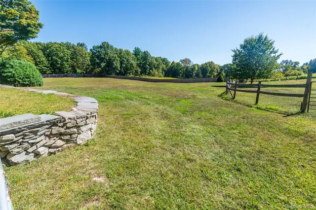 a view of a lake with a yard