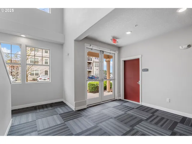a kitchen with a refrigerator sink and microwave