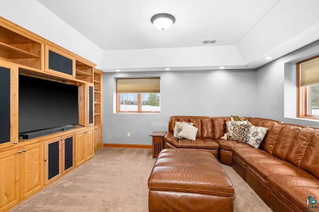 2542 Ziehl Road Carlton, MN 55718 - Photo 32 of 51 Living room featuring light carpet and recessed lighting