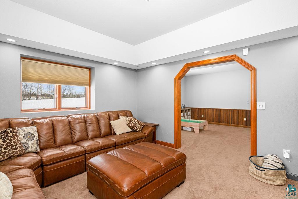 2542 Ziehl Road Carlton, MN 55718 - Photo 33 of 51 Living room with carpet, recessed lighting, and arched walkways