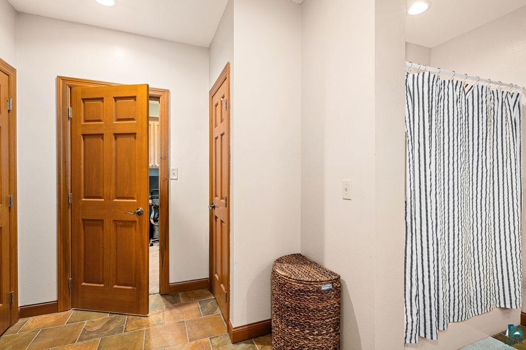 2542 Ziehl Road Carlton, MN 55718 - Photo 39 of 51 Entrance foyer featuring stone finish floors and recessed lighting