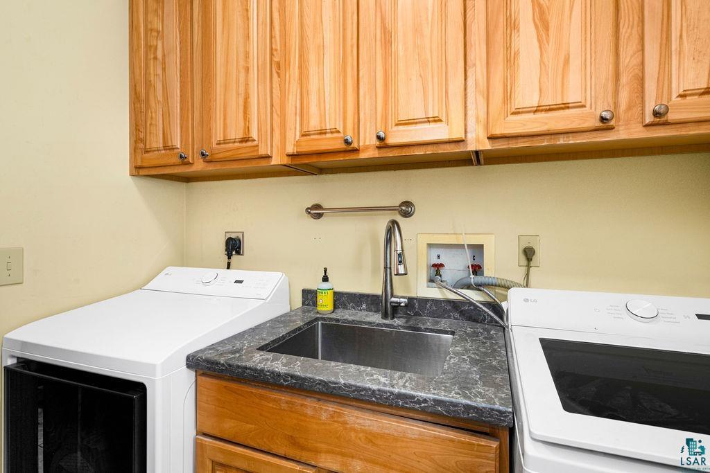 2542 Ziehl Road Carlton, MN 55718 - Photo 49 of 51 Laundry area featuring washer / dryer and cabinet space