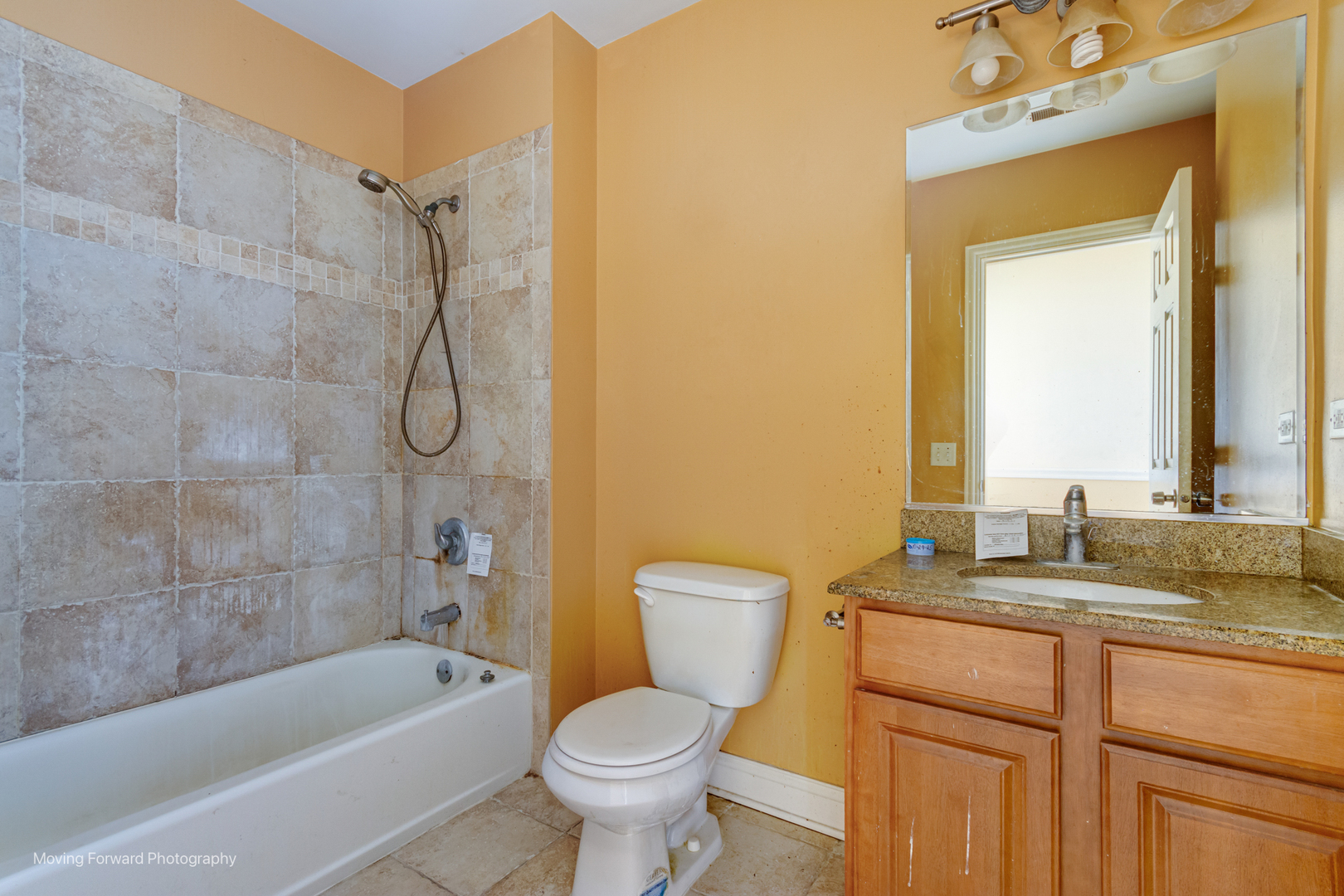 4900 South Vincennes Avenue, Unit 3 Chicago, IL 60615 - Photo 22 of 27 a bathroom with a granite countertop sink toilet and shower