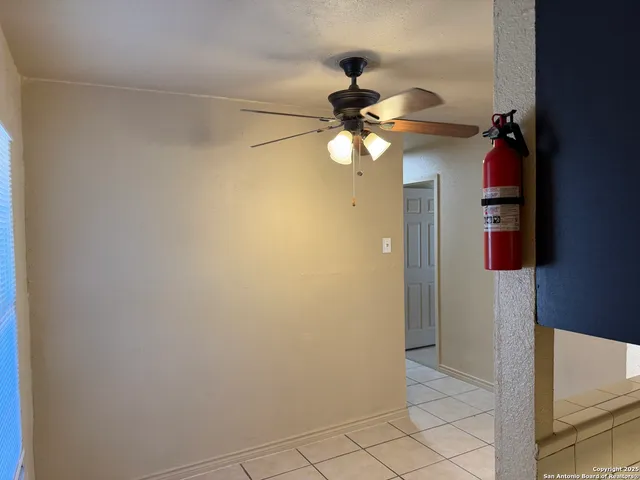 a view of a chandelier fan