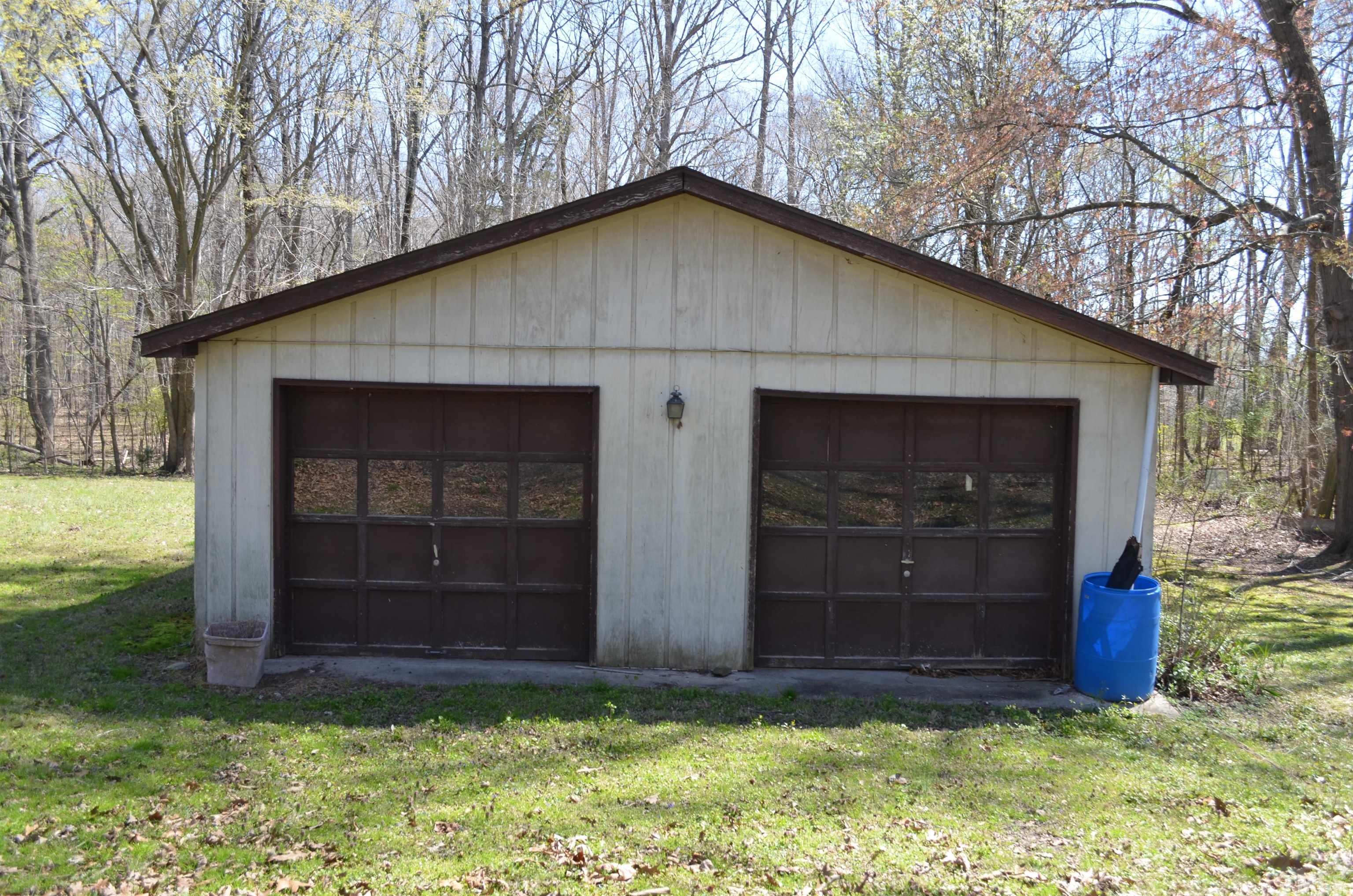 123 Joe Brown Road Bear Creek, NC 27207 - Photo 18 of 32 a view of front of a house with a yard