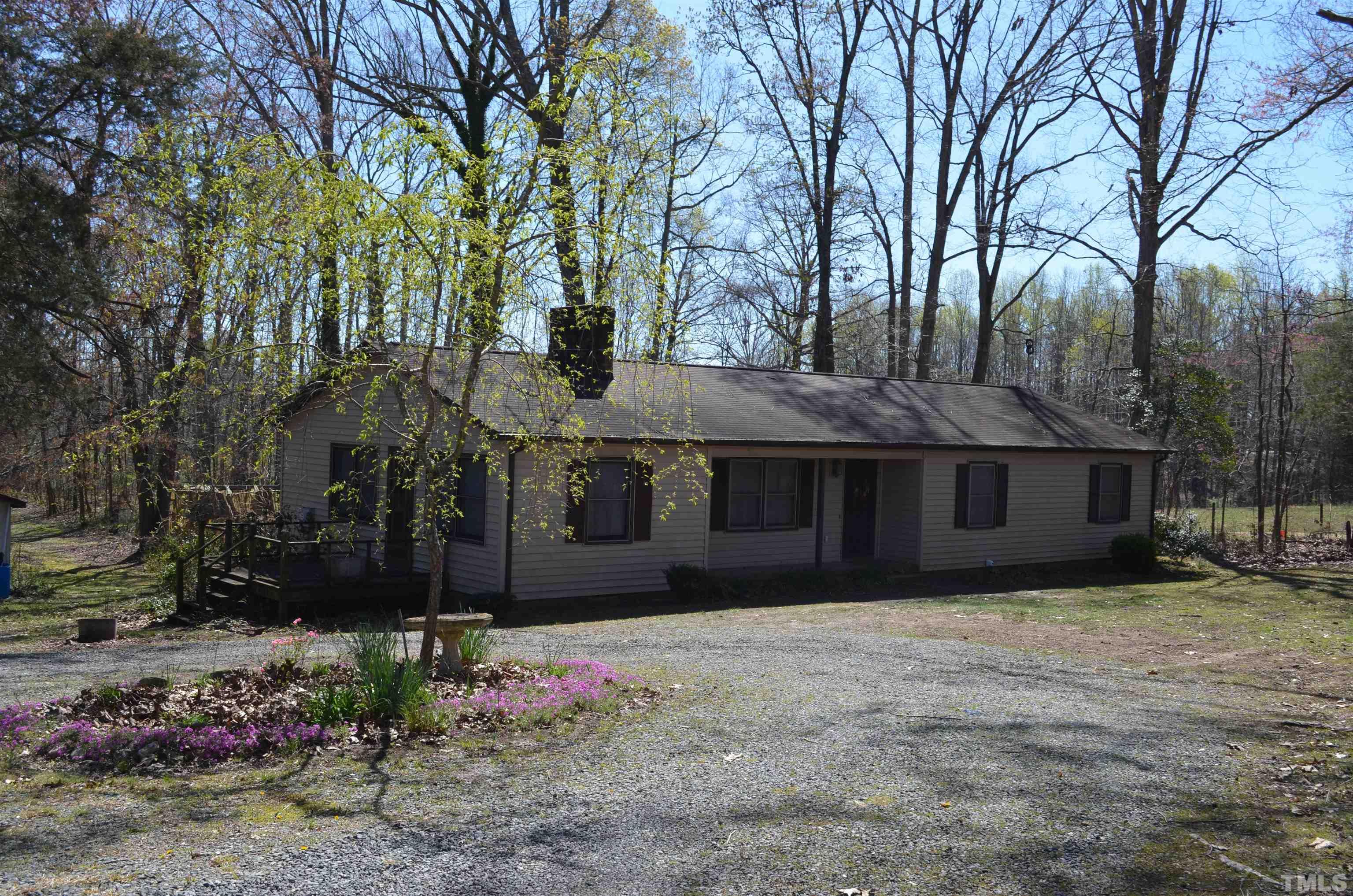 123 Joe Brown Road Bear Creek, NC 27207 - Photo 2 of 32 a front view of house with yard