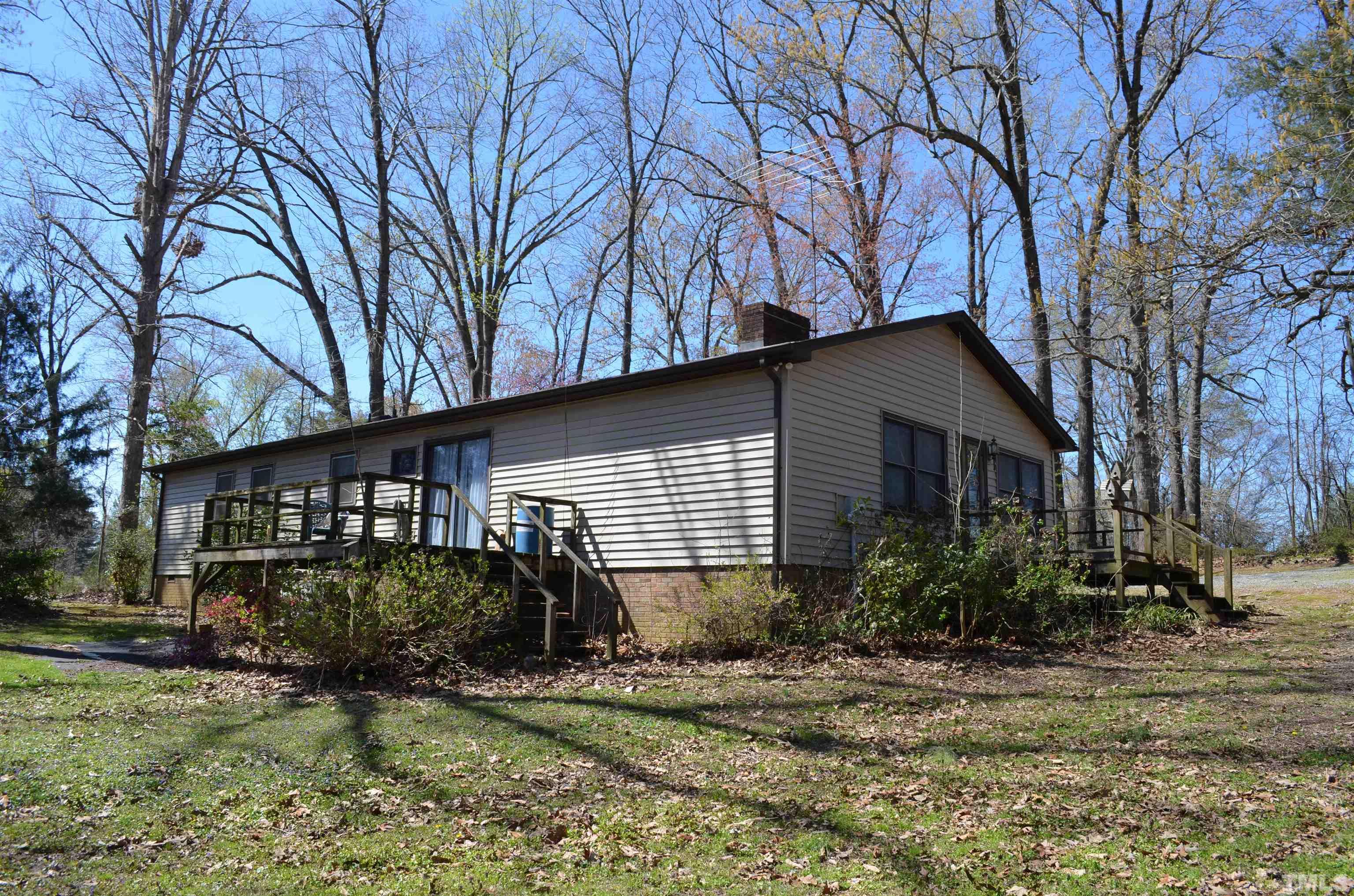 123 Joe Brown Road Bear Creek, NC 27207 - Photo 21 of 32 a house view with a outdoor space