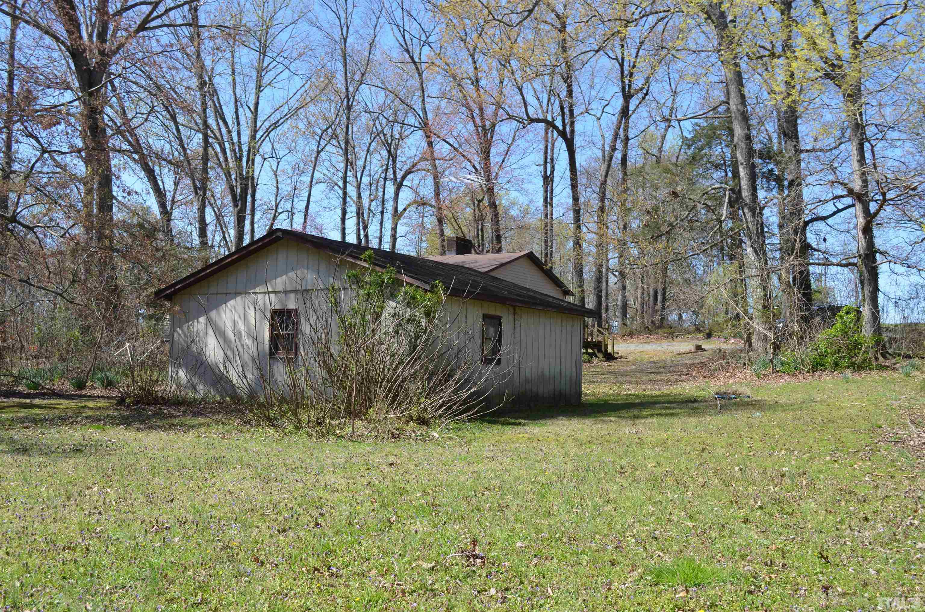 123 Joe Brown Road Bear Creek, NC 27207 - Photo 25 of 32 a view of backyard of house