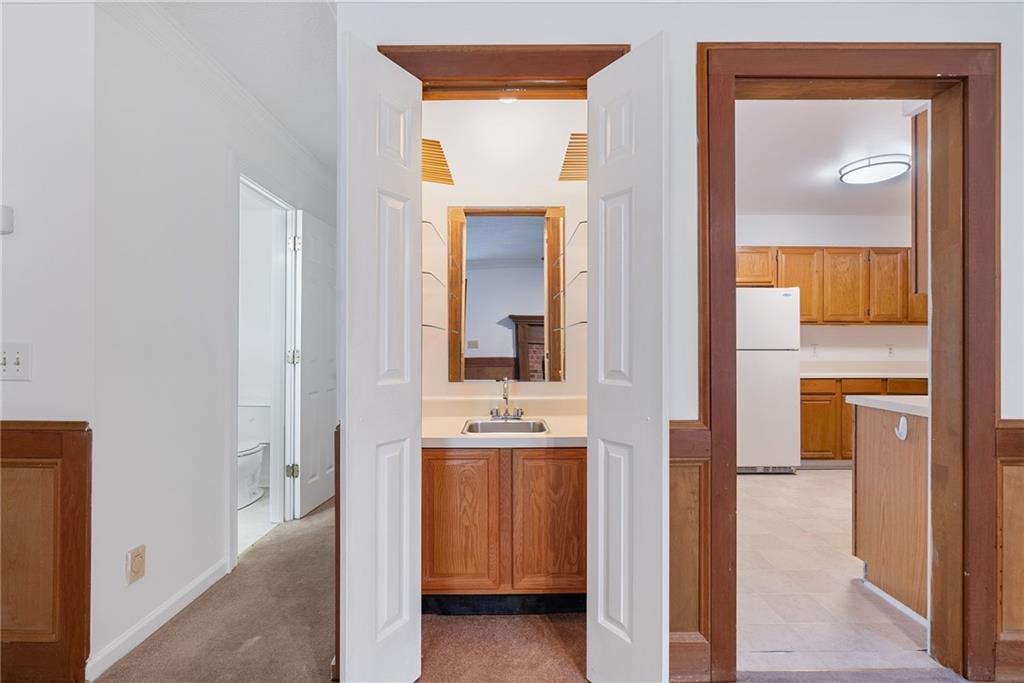 3278 Hampton Green Way Atlanta, GA 30340 - Photo 15 of 28 a view of a bathroom from a hallway