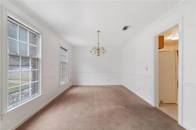 an empty room with windows