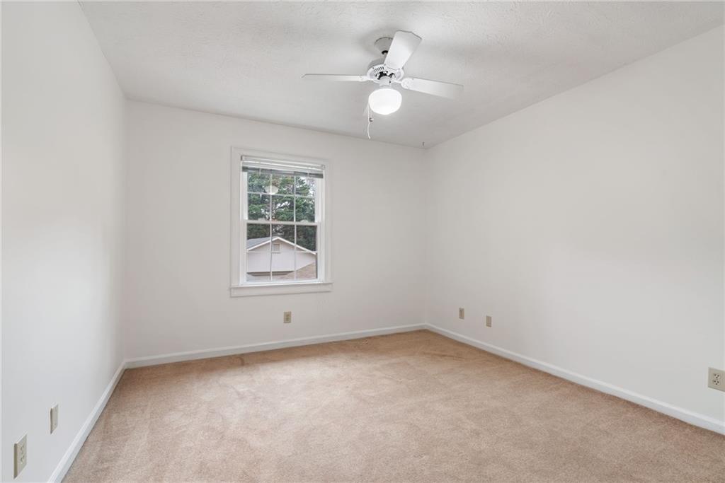 3278 Hampton Green Way Atlanta, GA 30340 - Photo 21 of 28 an empty room with a window