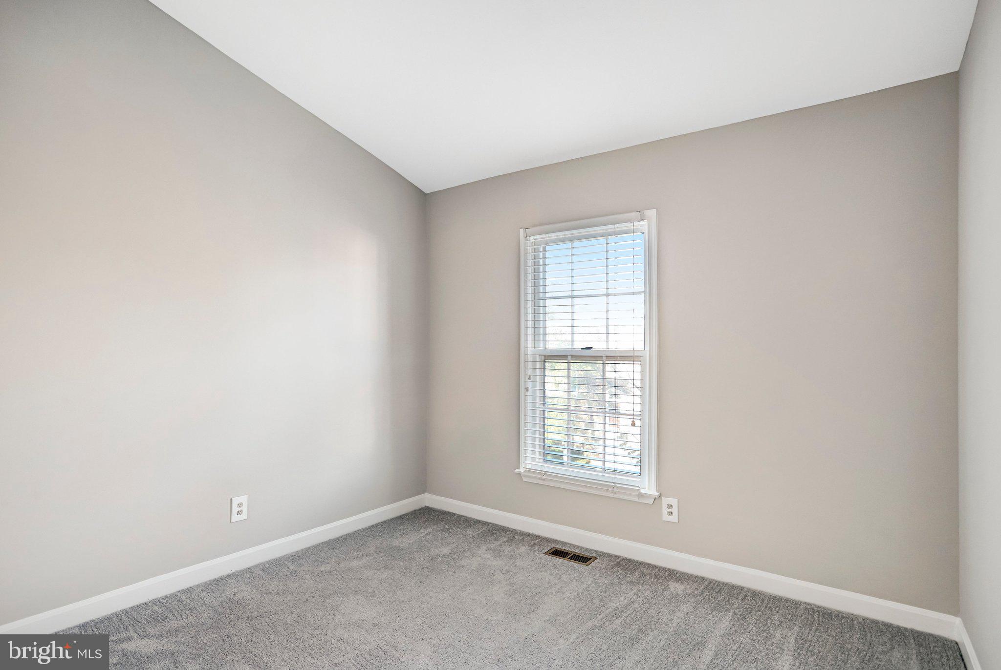 2807 Strauss Terrace Silver Spring, MD 20904 - Photo 17 of 26 an empty room with windows