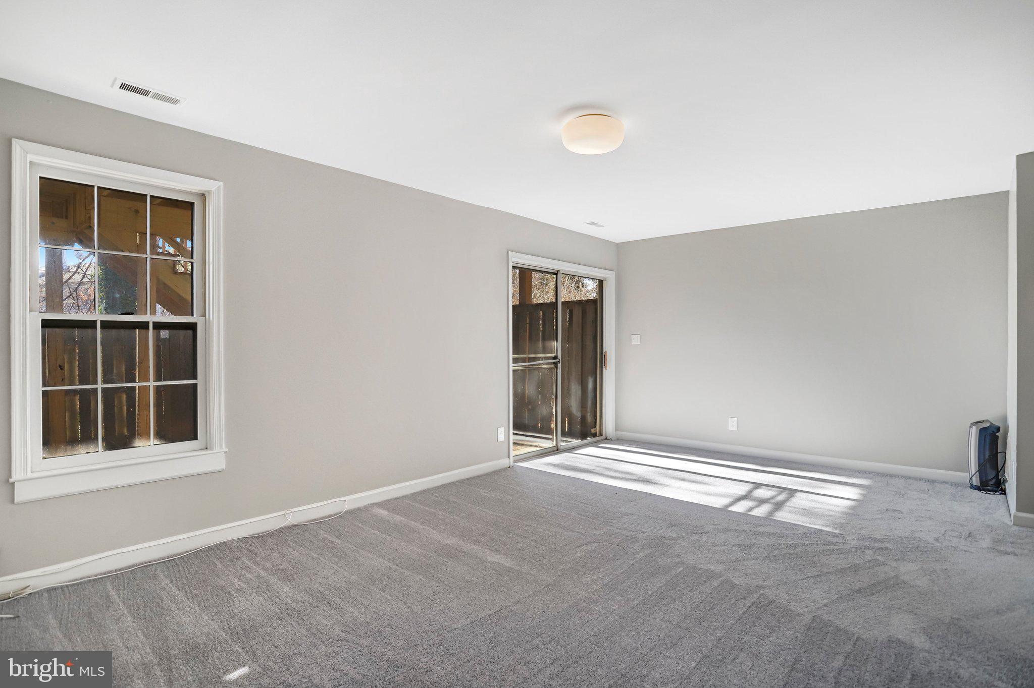 2807 Strauss Terrace Silver Spring, MD 20904 - Photo 21 of 26 a view of an empty room with a window