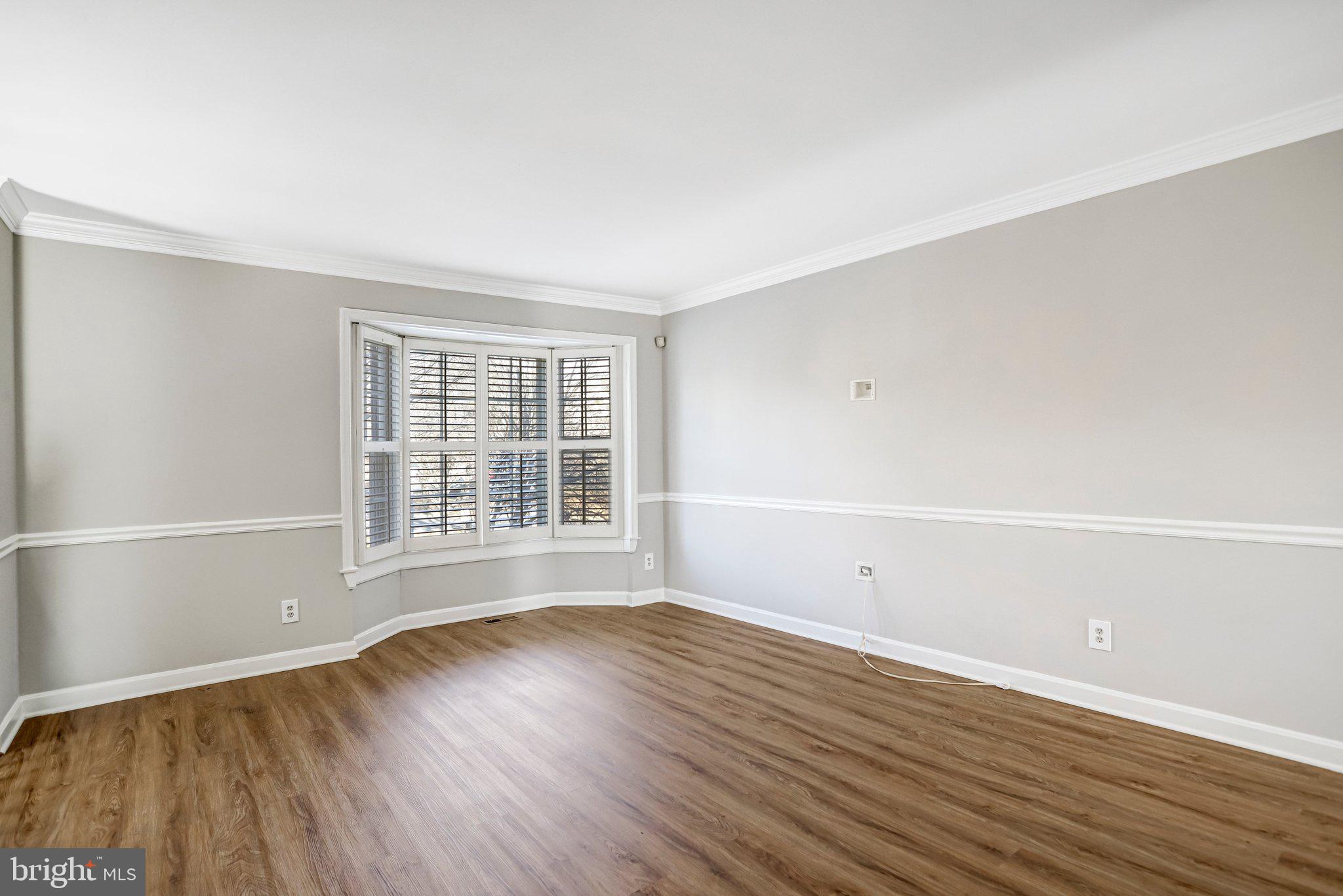 2807 Strauss Terrace Silver Spring, MD 20904 - Photo 3 of 26 an empty room with wooden floor and windows