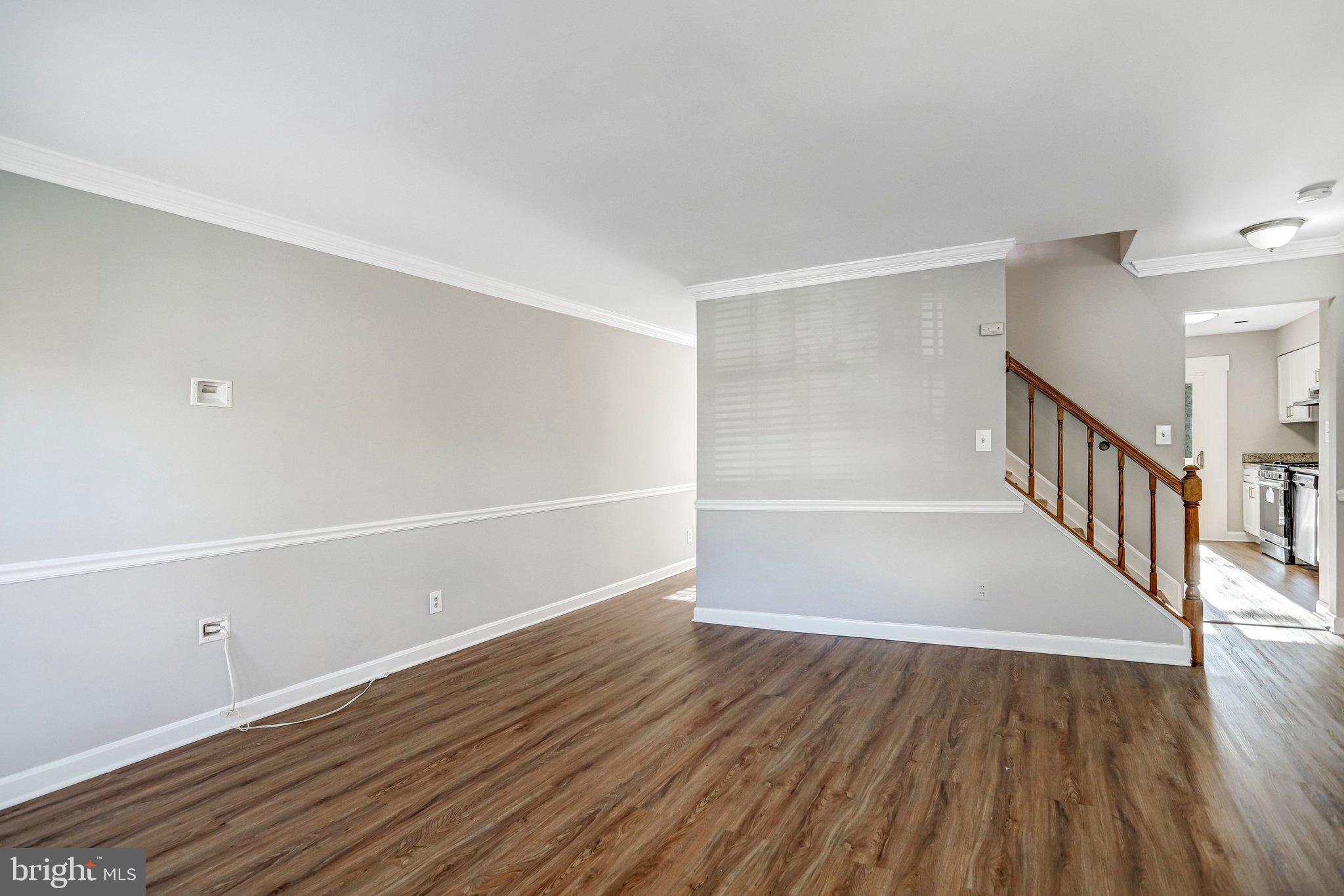 2807 Strauss Terrace Silver Spring, MD 20904 - Photo 4 of 26 a view of an empty room with wooden floor