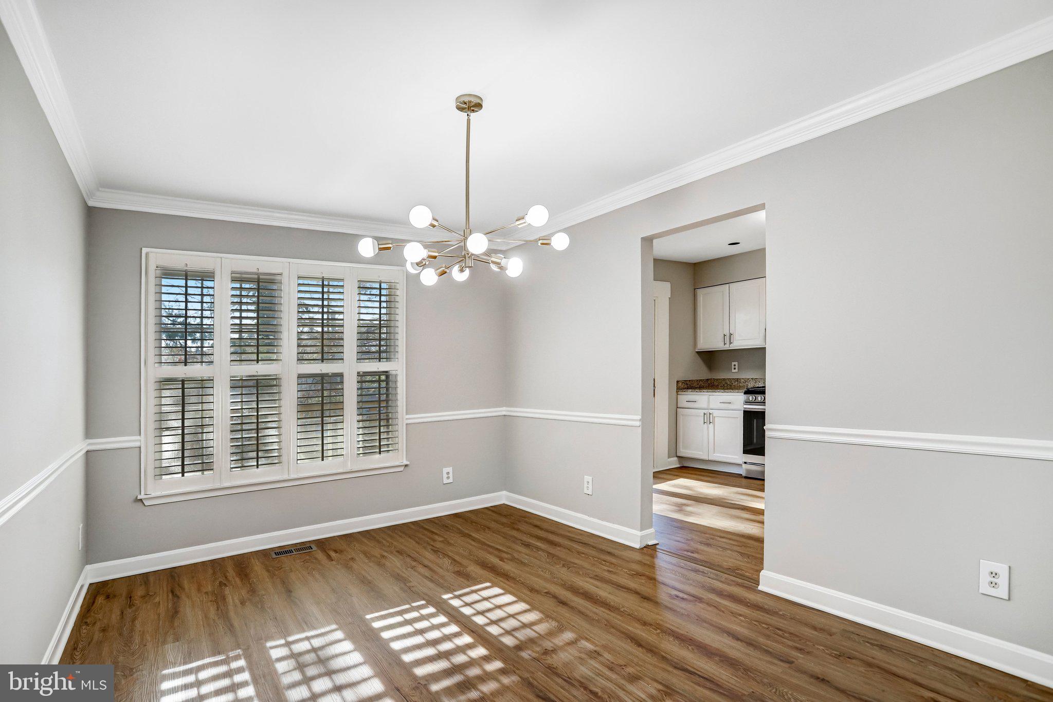 2807 Strauss Terrace Silver Spring, MD 20904 - Photo 7 of 26 a view of empty room with wooden floor and fan