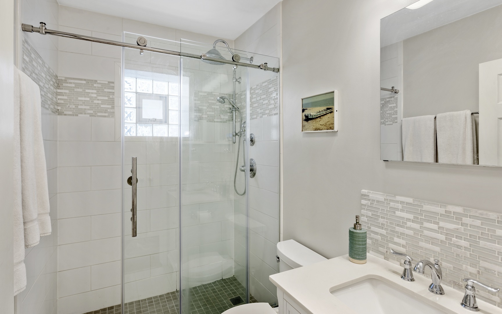 1214 West Webster Avenue, Unit 2E Chicago, IL 60614 - Photo 17 of 23 a bathroom with a sink toilet and shower