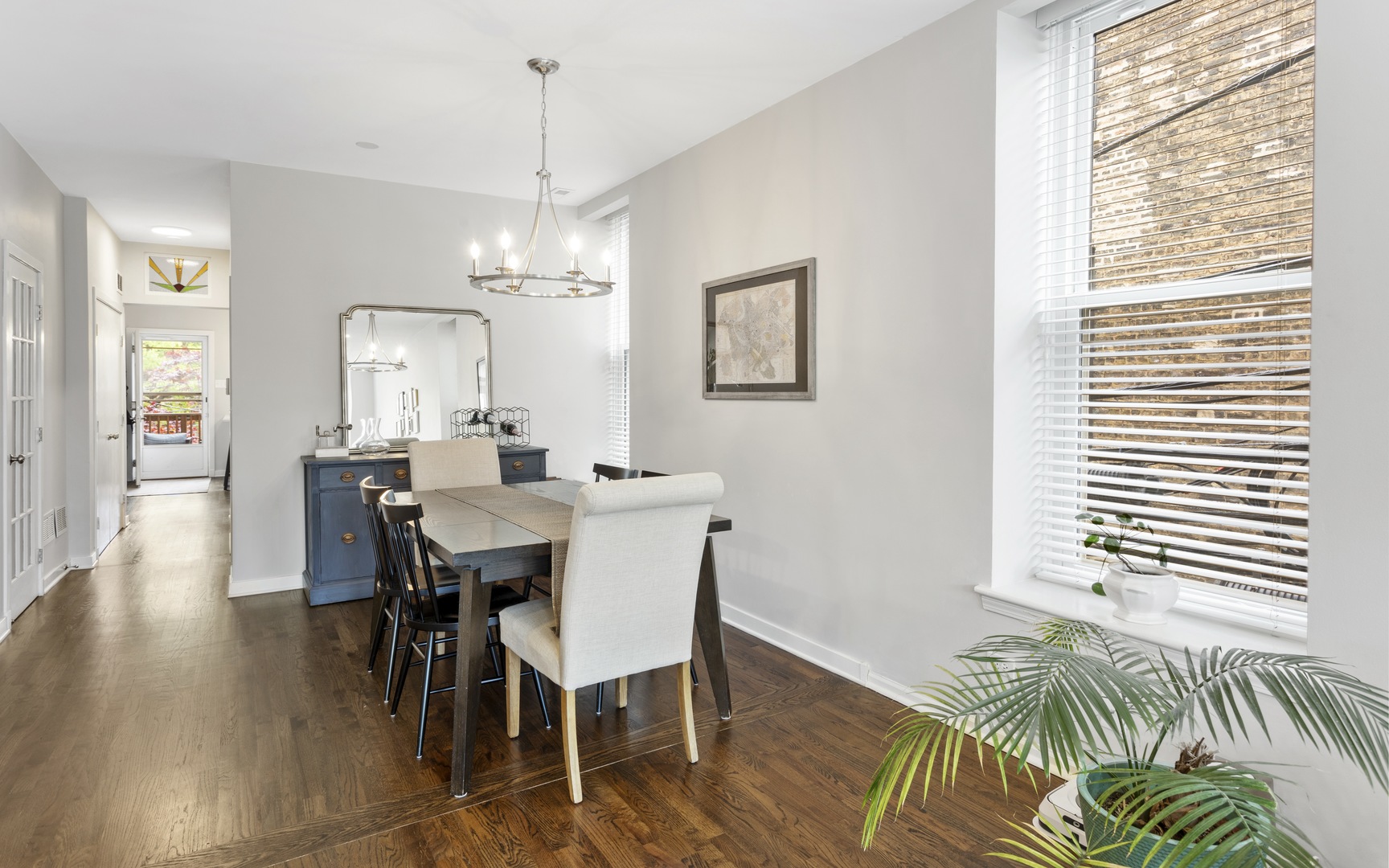 1214 West Webster Avenue, Unit 2E Chicago, IL 60614 - Photo 7 of 23 a view of a dining room with furniture and wooden floor