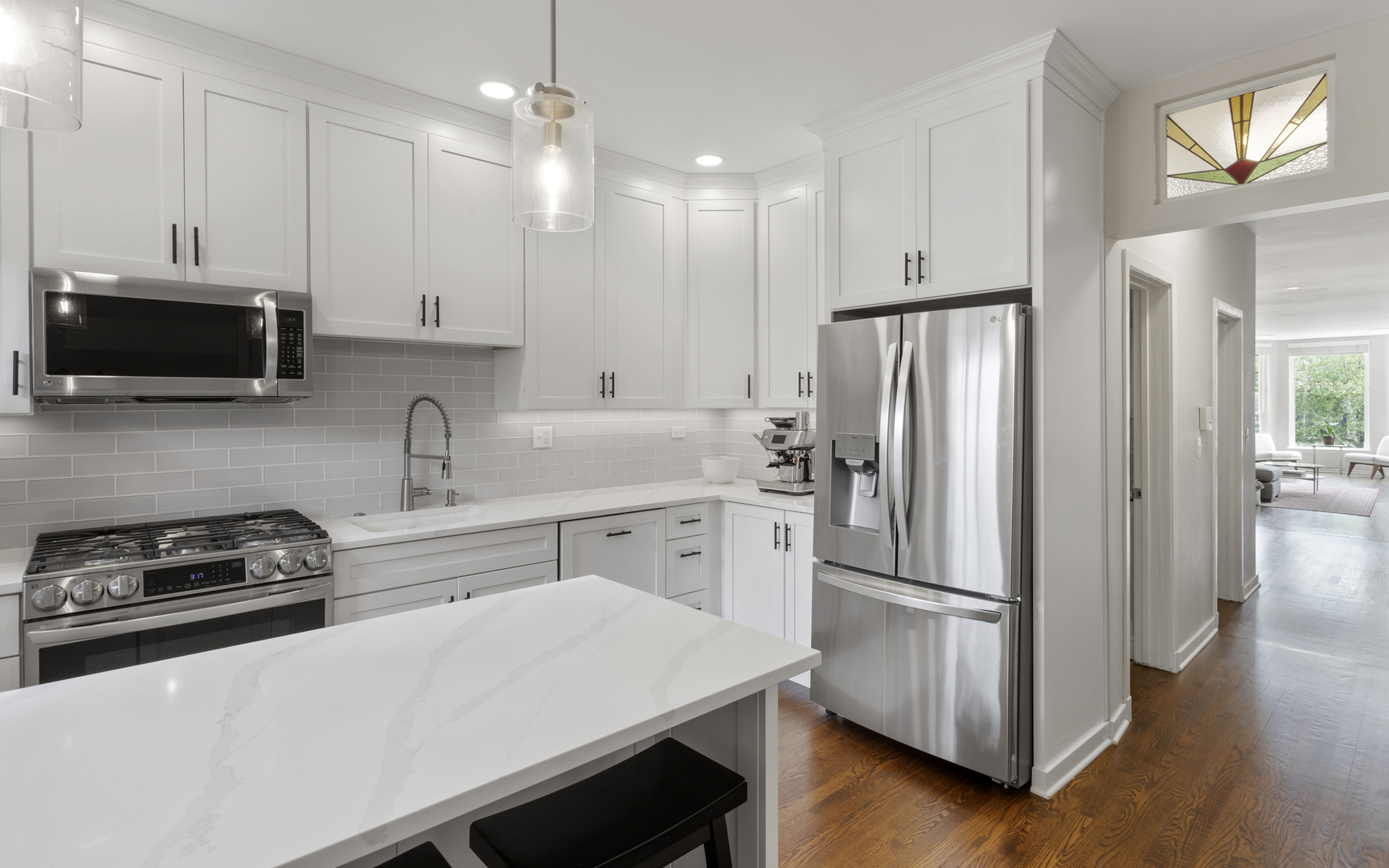 1214 West Webster Avenue, Unit 2E Chicago, IL 60614 - Photo 9 of 23 a kitchen with a refrigerator sink and microwave