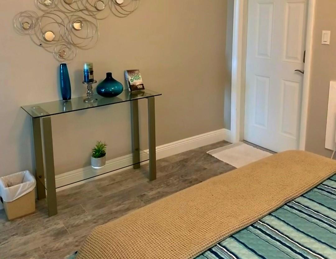 300 Duck Key Drive, Unit 6 Marathon, FL 33050 - Photo 13 of 32 a bedroom with a bed and cabinets