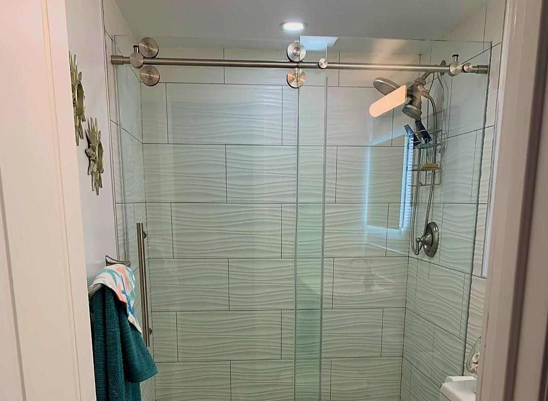 300 Duck Key Drive, Unit 6 Marathon, FL 33050 - Photo 16 of 32 a bathroom with a shower