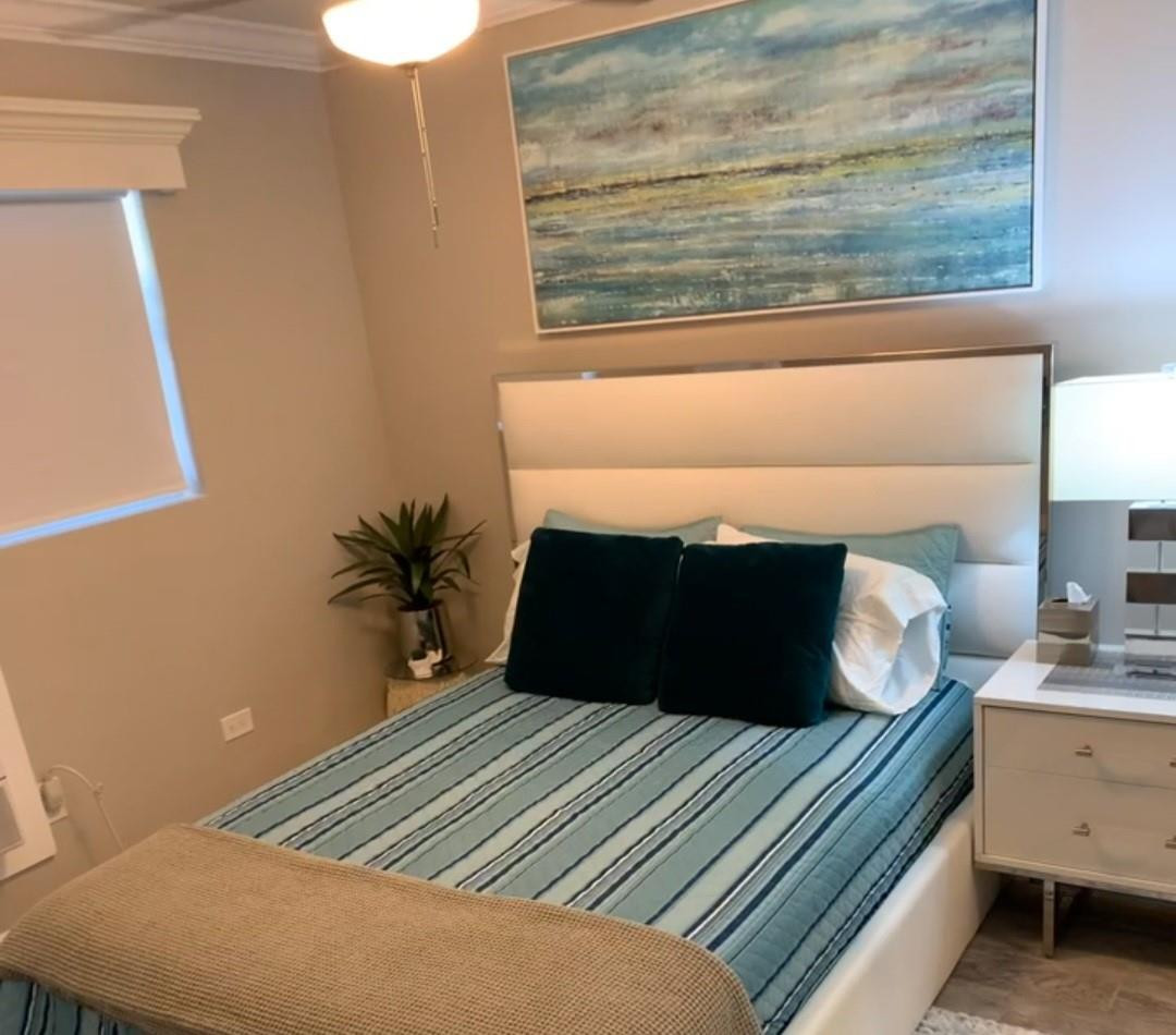 300 Duck Key Drive, Unit 6 Marathon, FL 33050 - Photo 3 of 32 a bedroom with a bed and a window