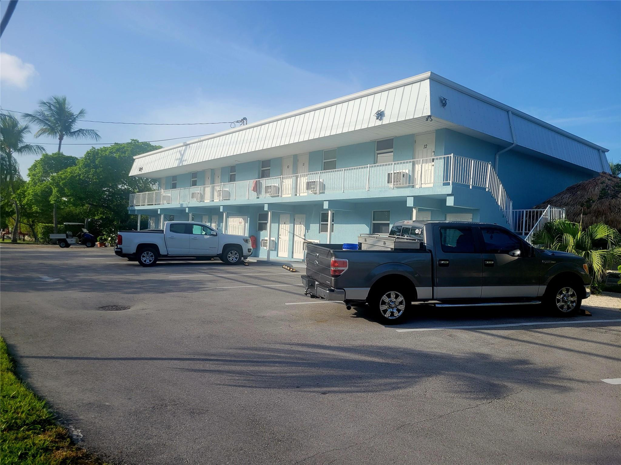 300 Duck Key Drive, Unit 6 Marathon, FL 33050 - Photo 6 of 32 a car parked in front of a building