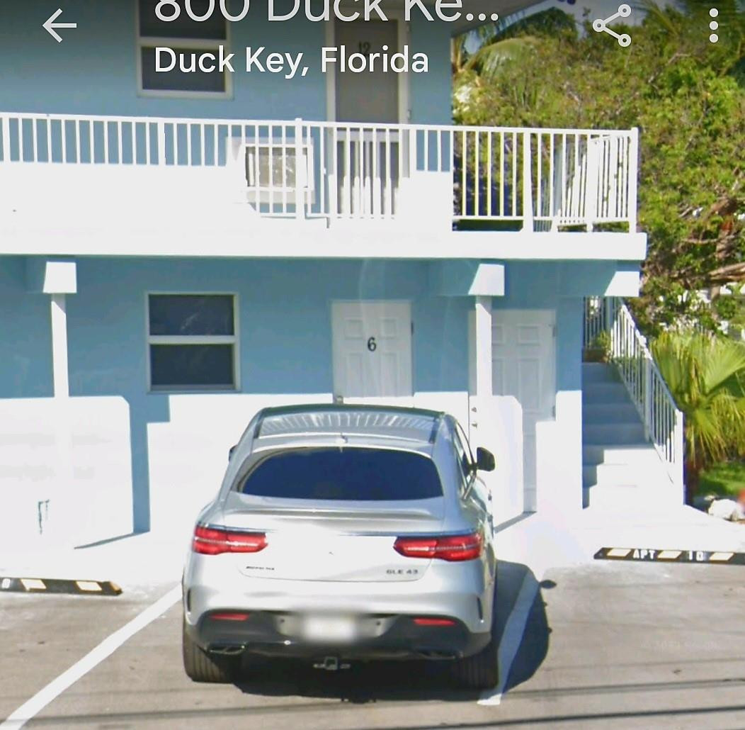 300 Duck Key Drive, Unit 6 Marathon, FL 33050 - Photo 8 of 32 a car parked in front of a house