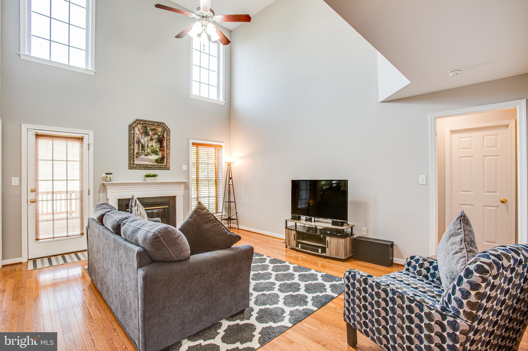 1 Riggs Road Fredericksburg, VA 22405 - Photo 11 of 55 Sunlit vaulted family room with door to deck