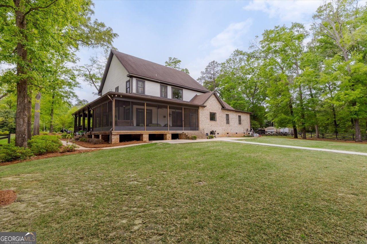 1031 Cherokee Road Perry, GA 31069 - Photo 93 of 104 a view of a house with a yard