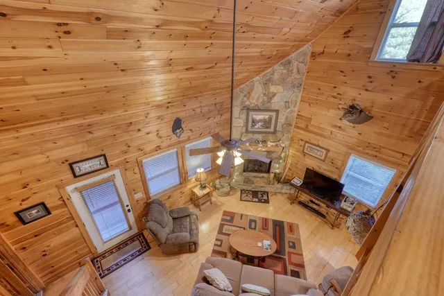 a bedroom with furniture and a window