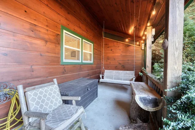 a view of a table and chairs in the yard