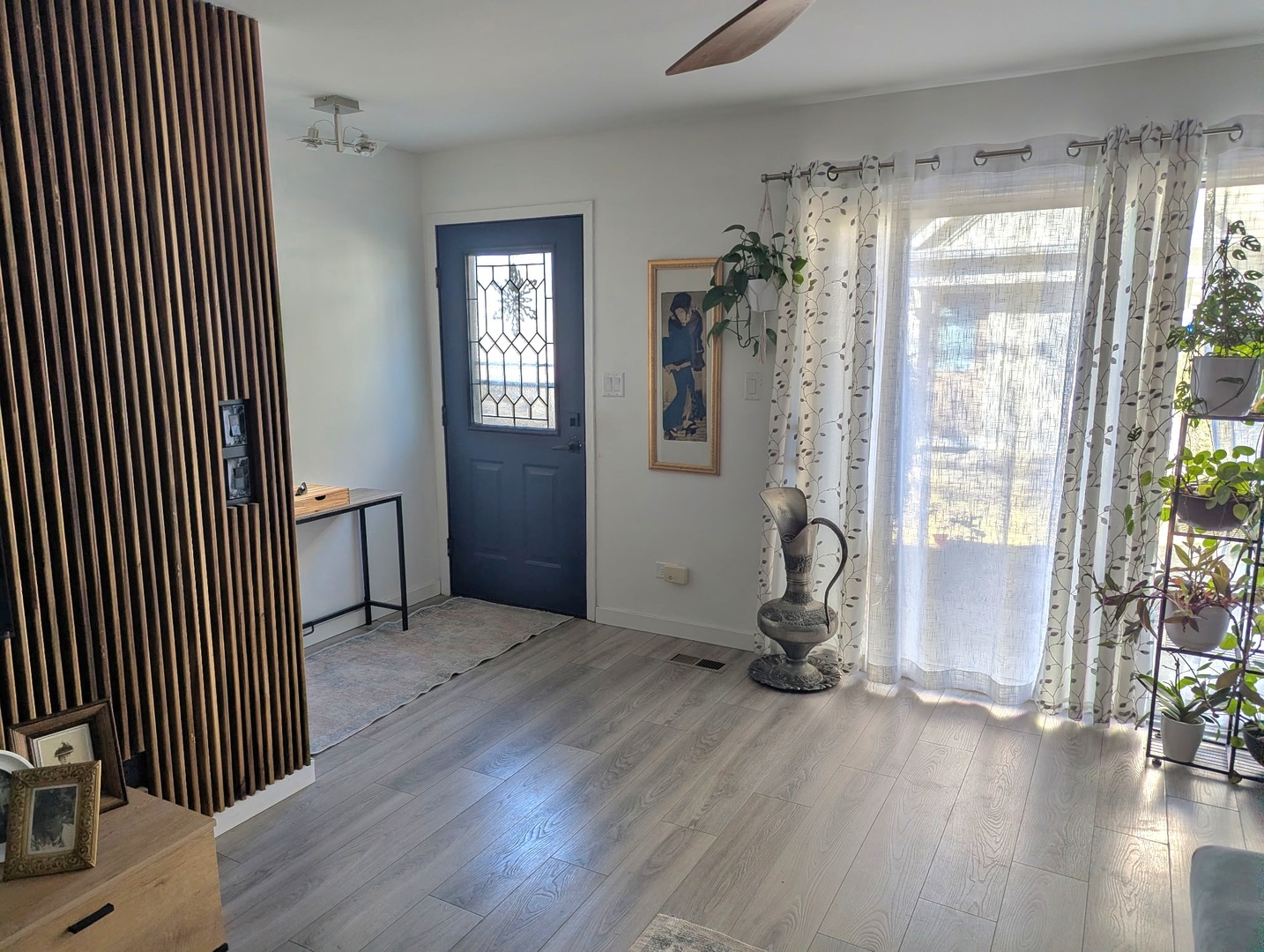 448 Bridle Trail, Unit 448 Wheeling, IL 60090 - Photo 2 of 14 a view of a room with wooden floor and windows