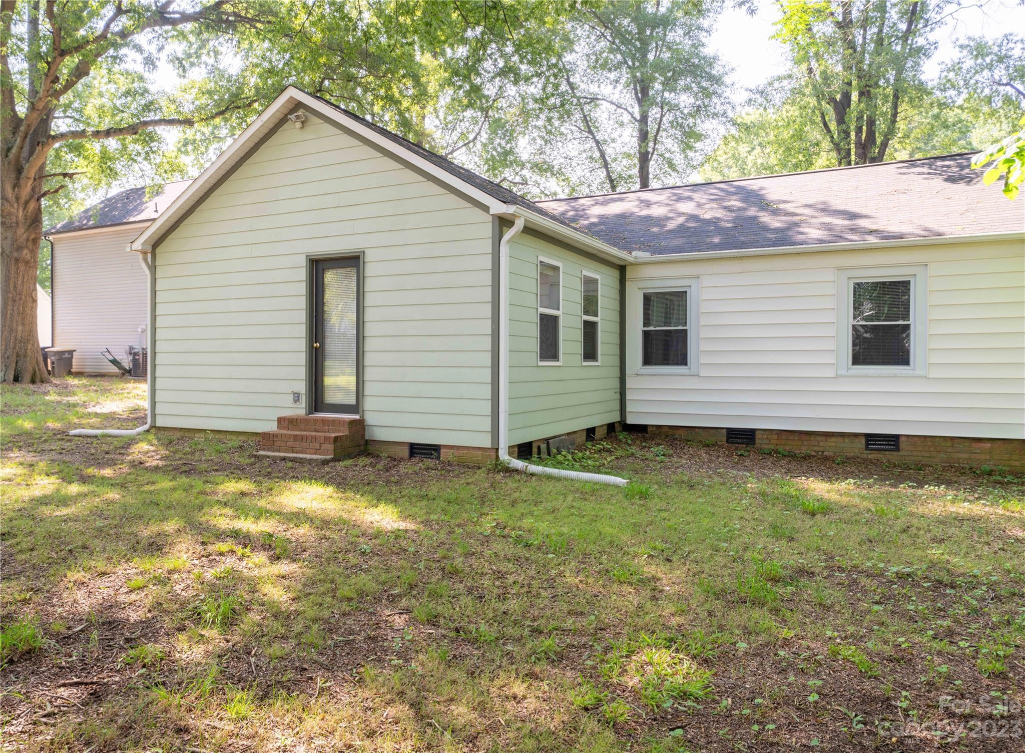 507 Cook Street Kannapolis, NC 28083 - Photo 13 of 38 a view of a backyard with a garden