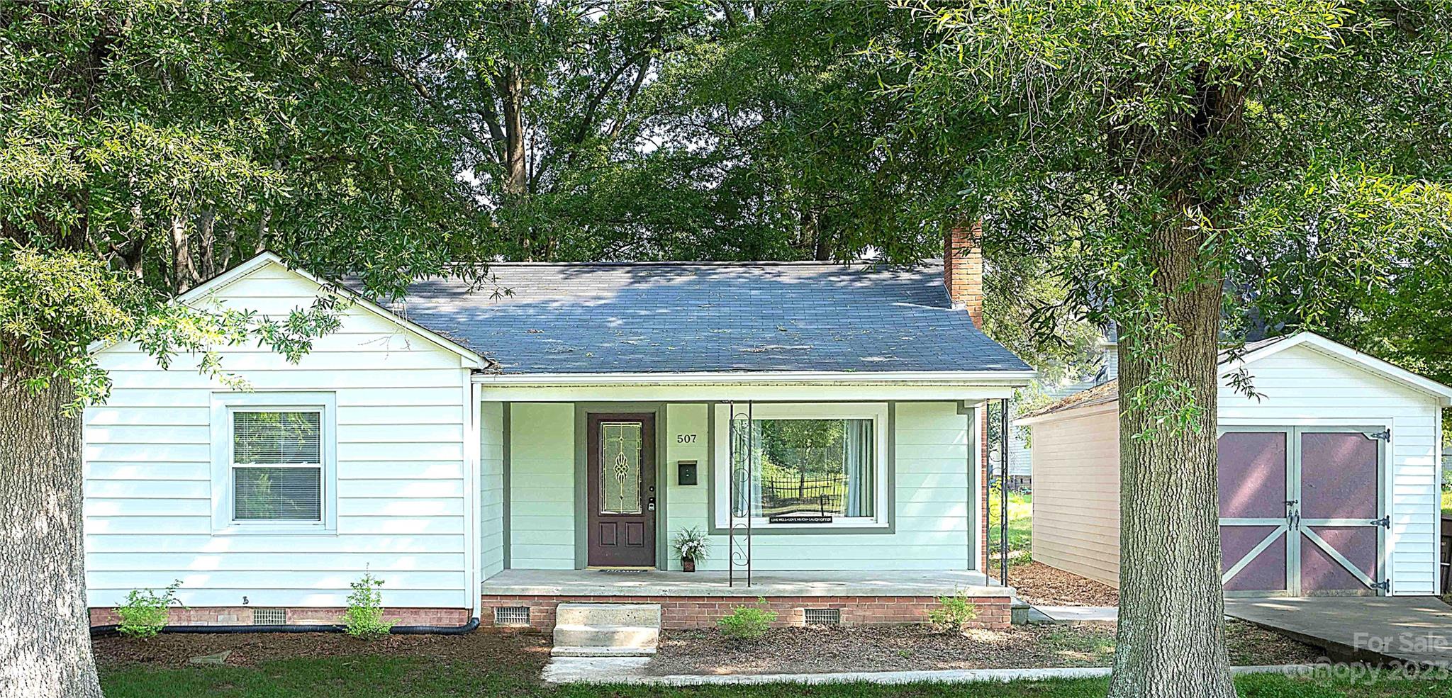 507 Cook Street Kannapolis, NC 28083 - Photo 37 of 38 a view of a house with a yard and sitting area