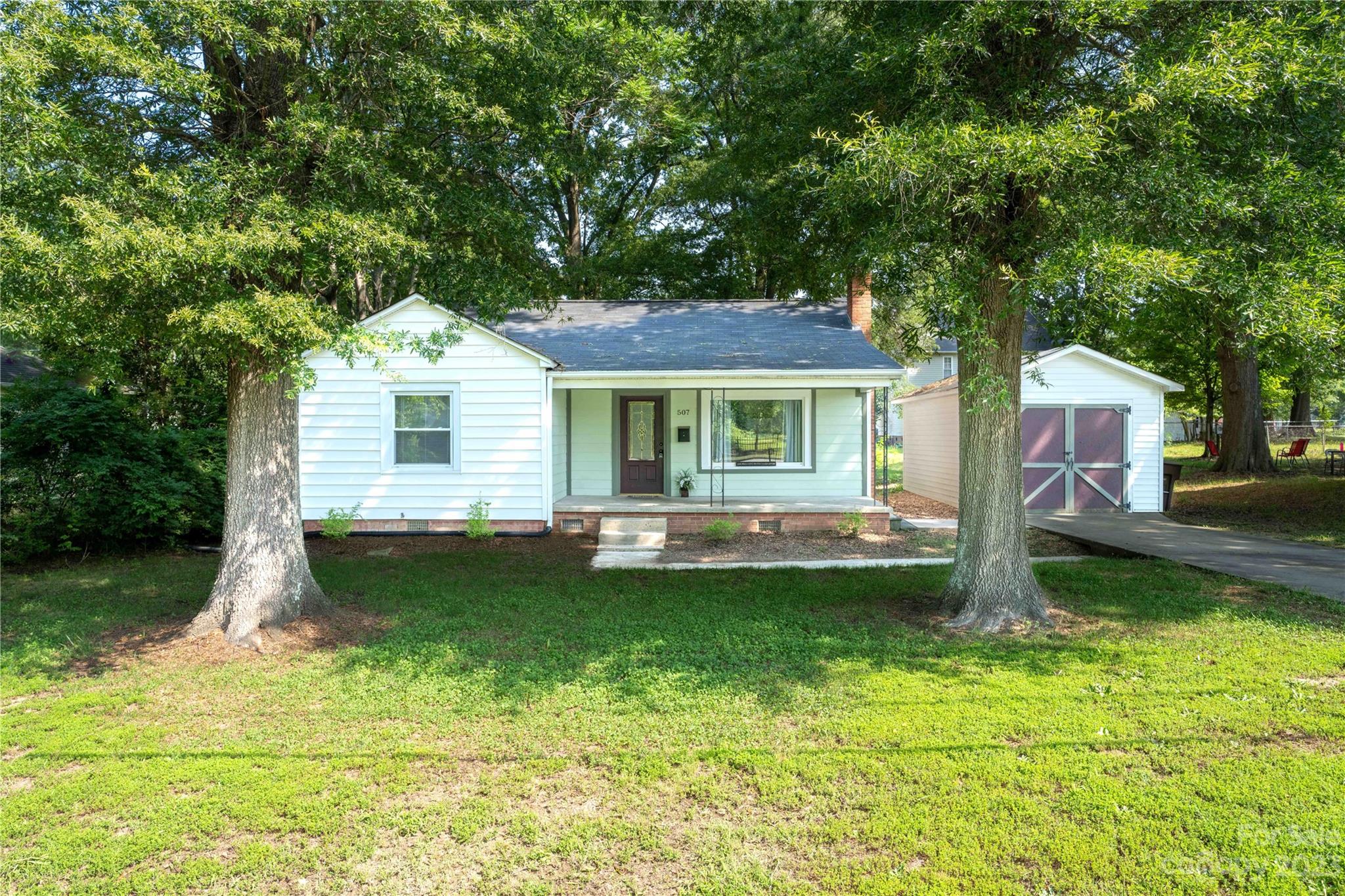 507 Cook Street Kannapolis, NC 28083 - Photo 8 of 38 a front view of a house with a yard